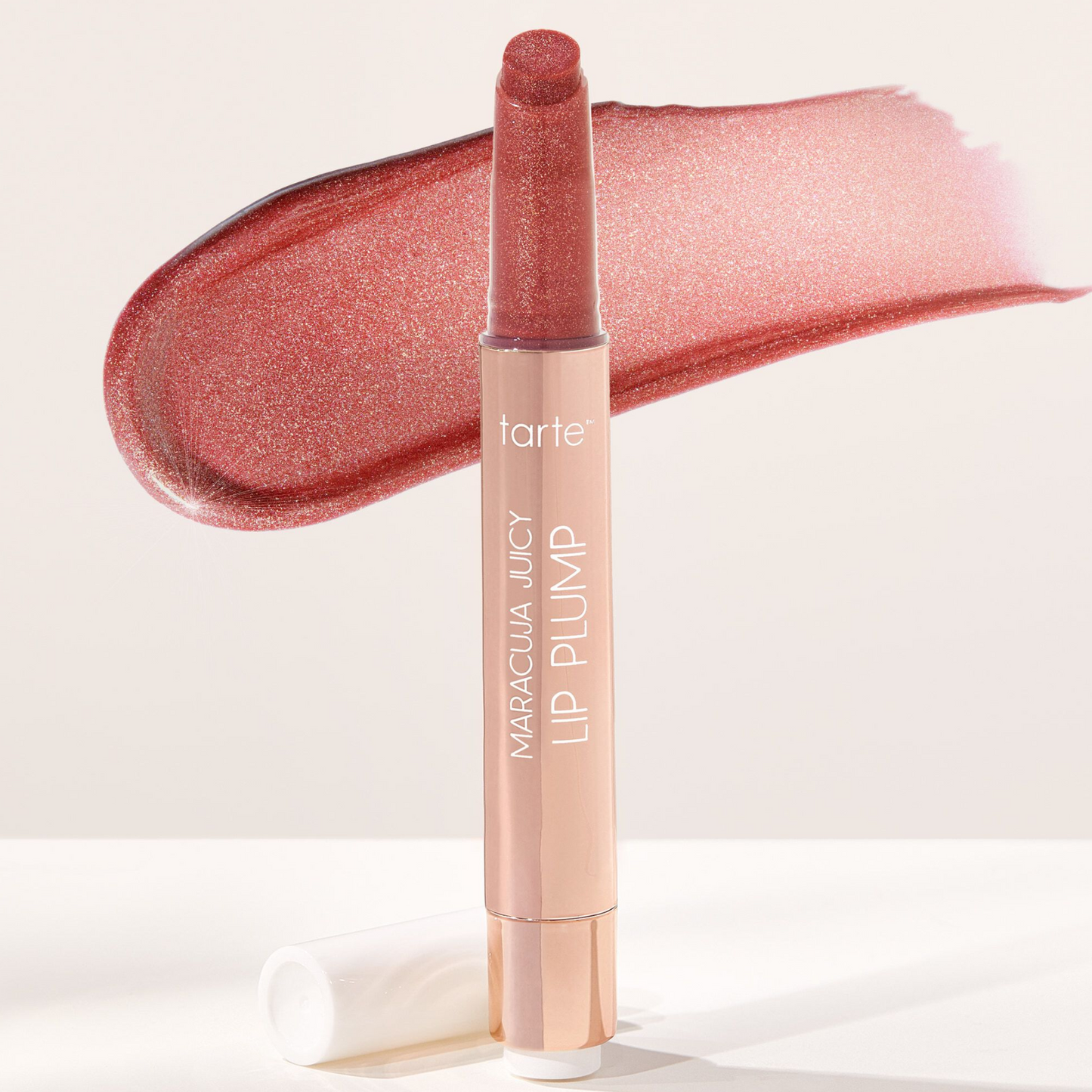 Labial MARACUJA JUICY SHIMMER GLASS LIP PLUMP TARTE