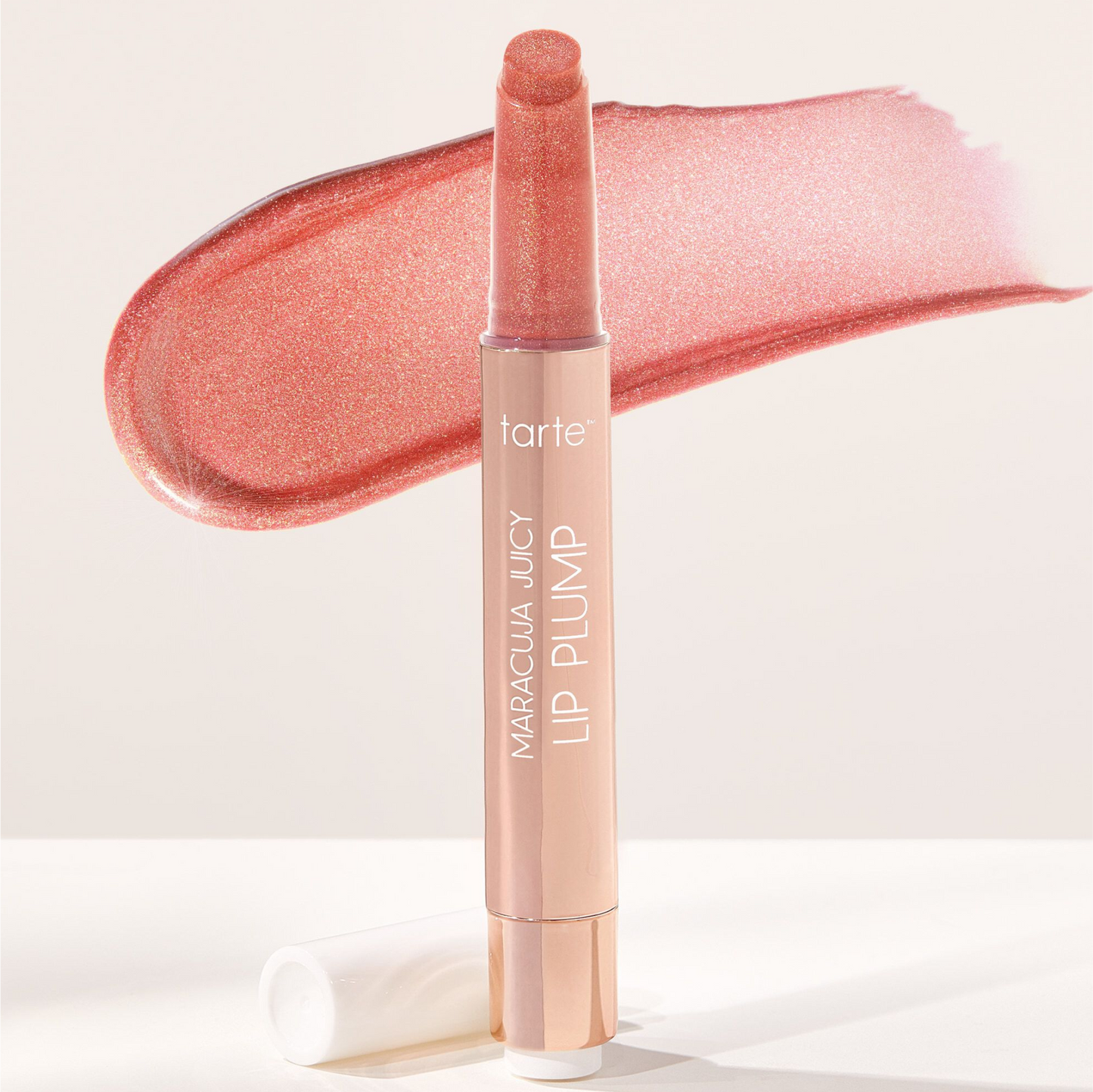 Labial MARACUJA JUICY SHIMMER GLASS LIP PLUMP TARTE