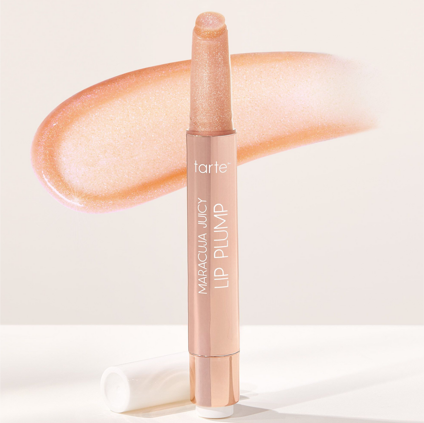 Labial MARACUJA JUICY SHIMMER GLASS LIP PLUMP TARTE