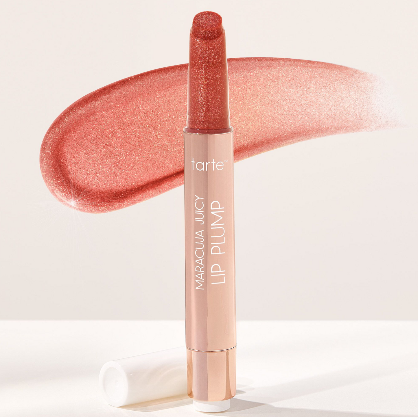 Labial MARACUJA JUICY SHIMMER GLASS LIP PLUMP TARTE