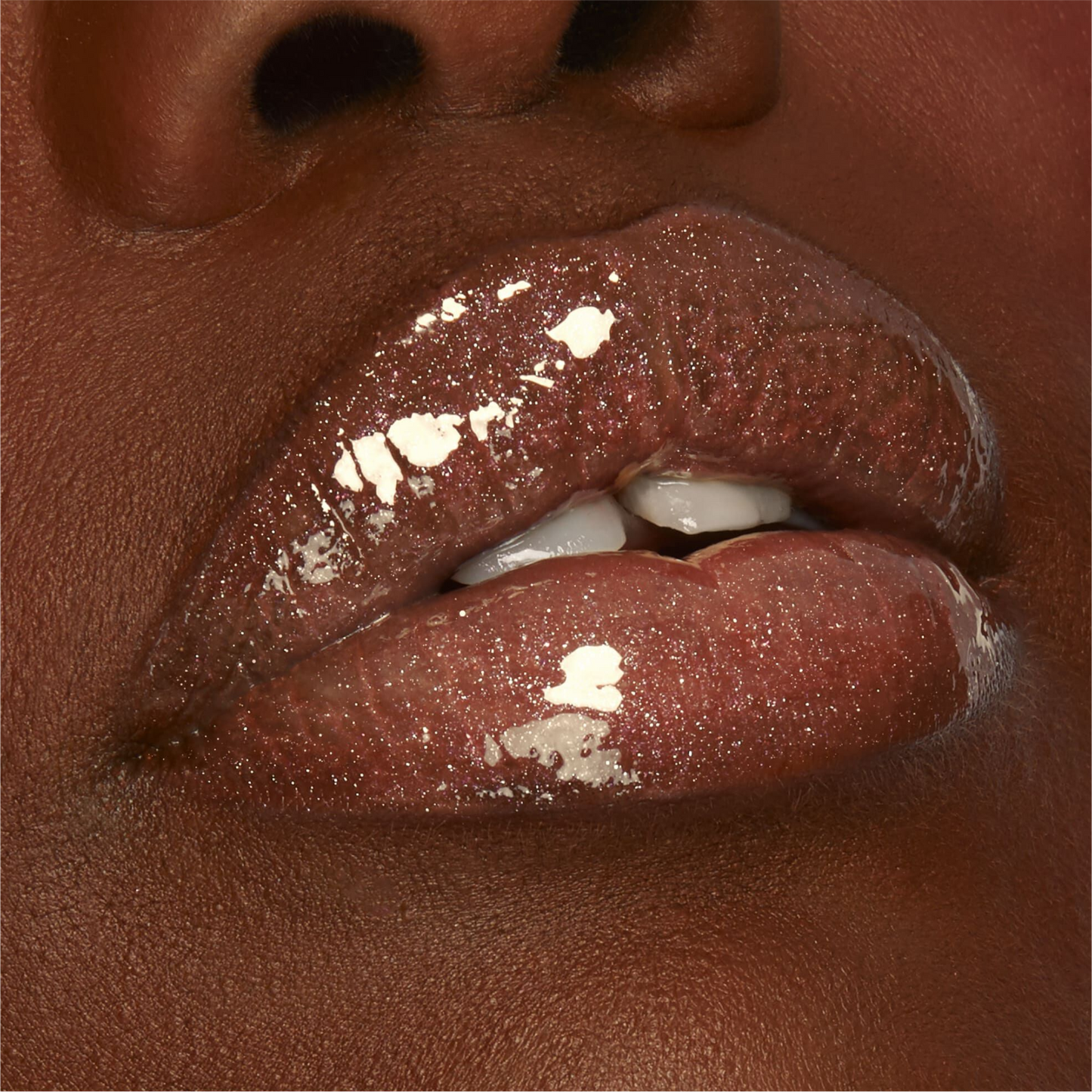 Labial MARACUJA JUICY SHIMMER GLASS LIP PLUMP TARTE